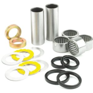 The Off-Road Suspension Bearing Service, featuring metal bearings, cylindrical spacers, washers, and rubber seals for dirt bike steering head bearings and suspension linkages, is displayed against a white background.
